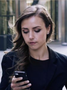 Business Women Checking An App , Application Development