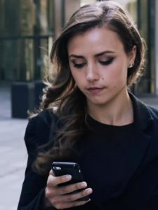 Business Women Checking An App , Application Development